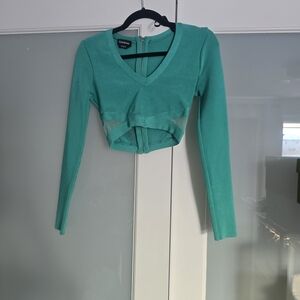 bebe Teal Cropped V-Neck Long Sleeve Top with Zip Detail